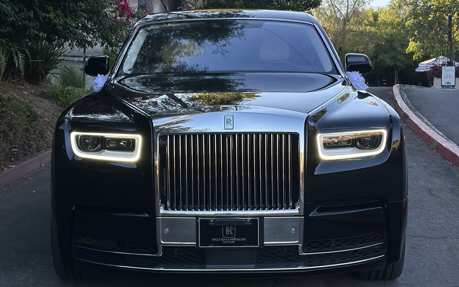 Black Rolls-Royce Phantom on a Beverly Hills driveway
